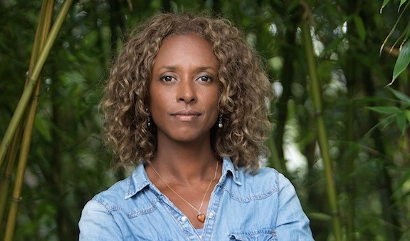 Close-up portrait of Gillian Burke wearing a jeans shirt