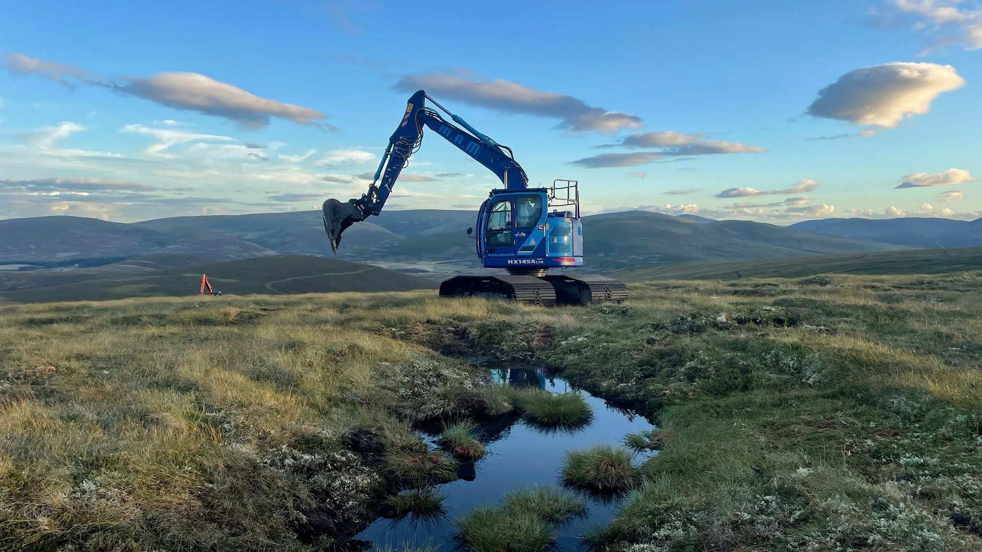 Blue digger restoring a peatland