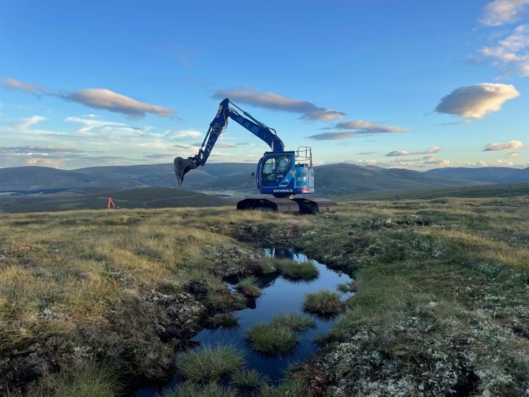 Blue digger restoring a peatland