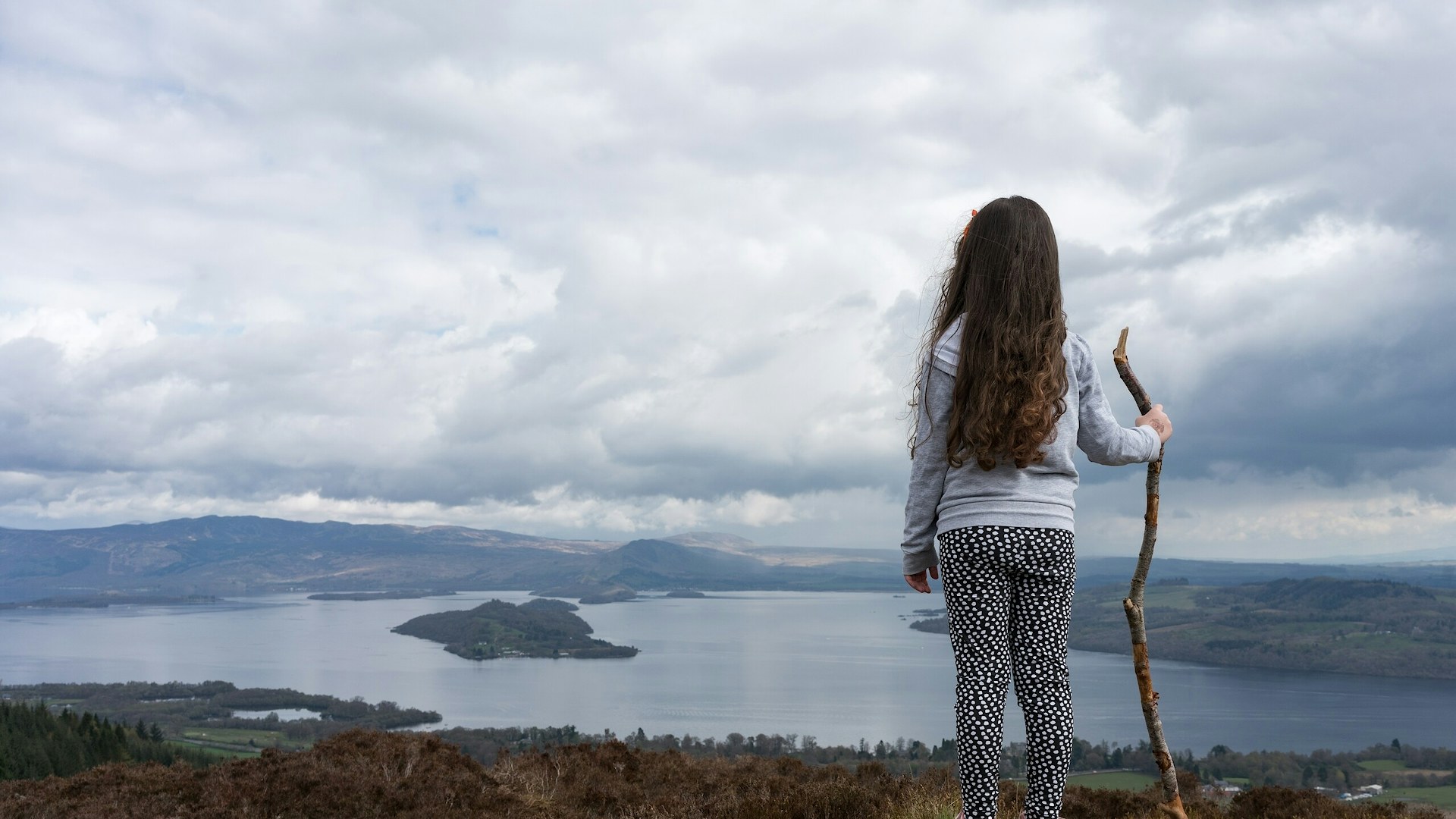 Child looking at cairngorms national park