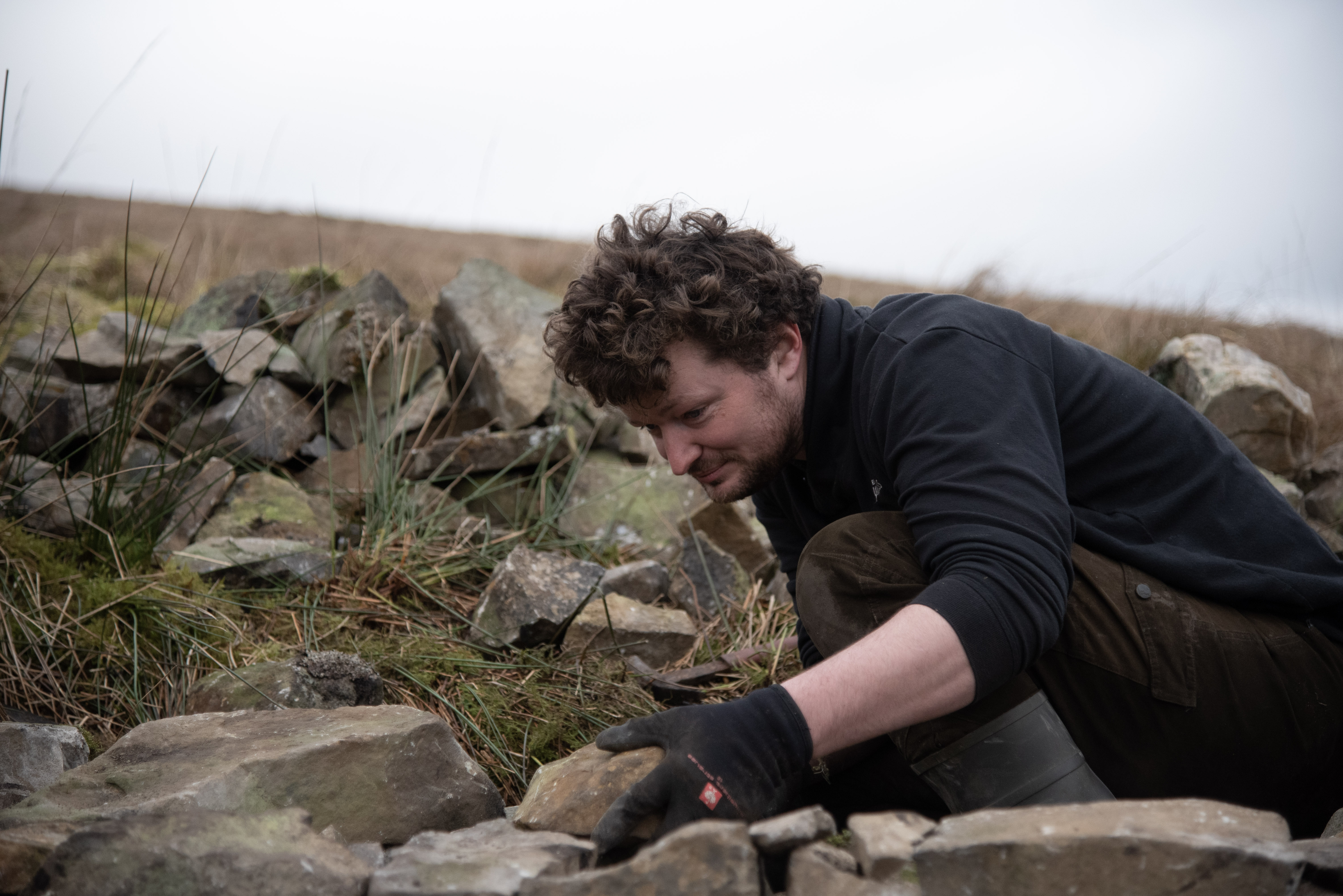 Jamie McEwan, Conservation Manager at Rewilding Network project Kingsdale Head, drystone walling at Kingsdale Head.