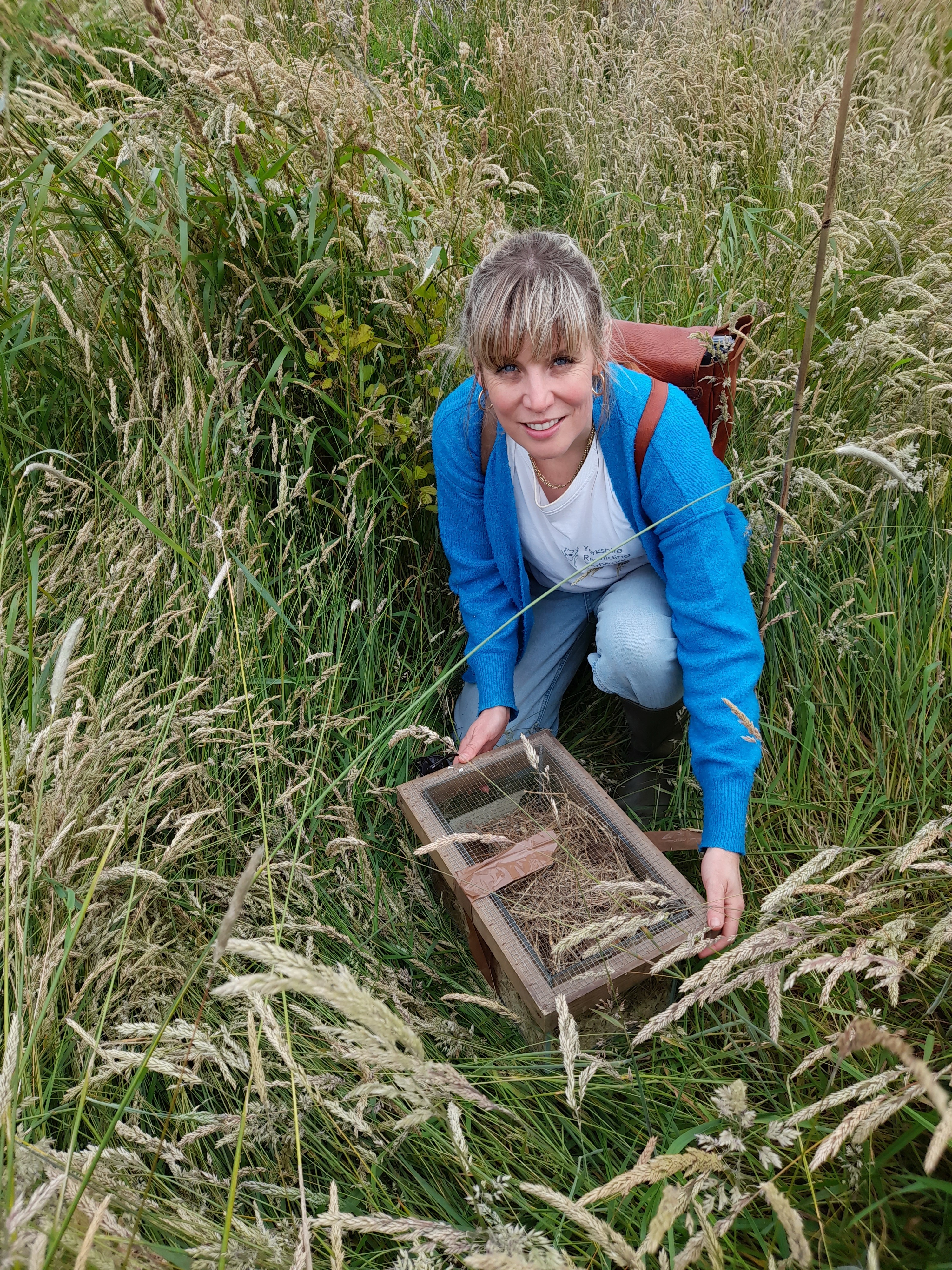 Yorkshire Rewilding Network's (former) Rewilding Hubs Officer, Claire Blindell, with a harvest mouse box.