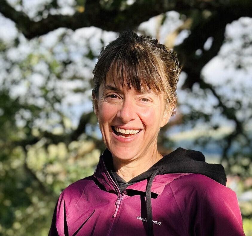 Rebecca wrigley on tree trunk
