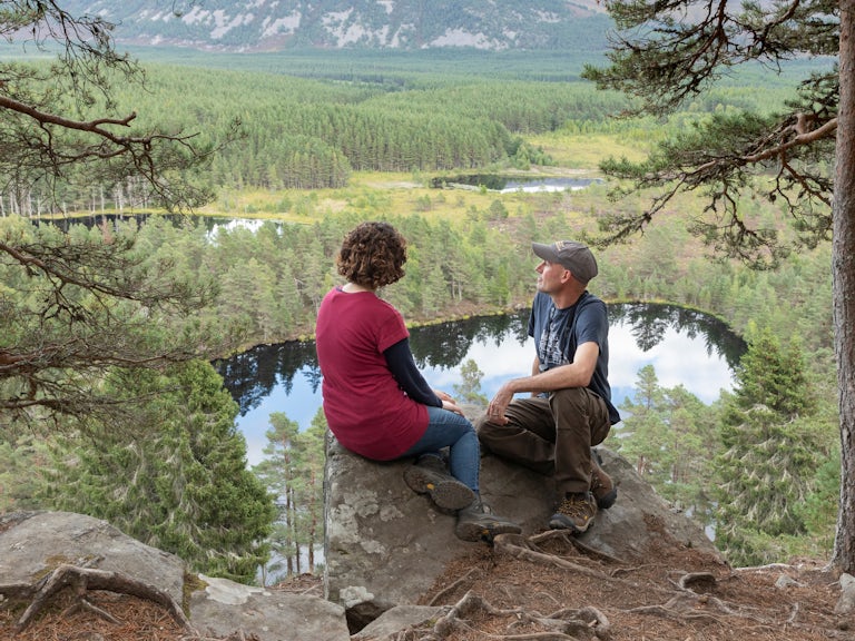 Two people looking over Cairngorms