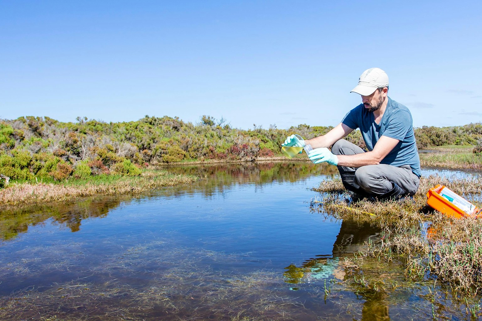 Man taking water sample