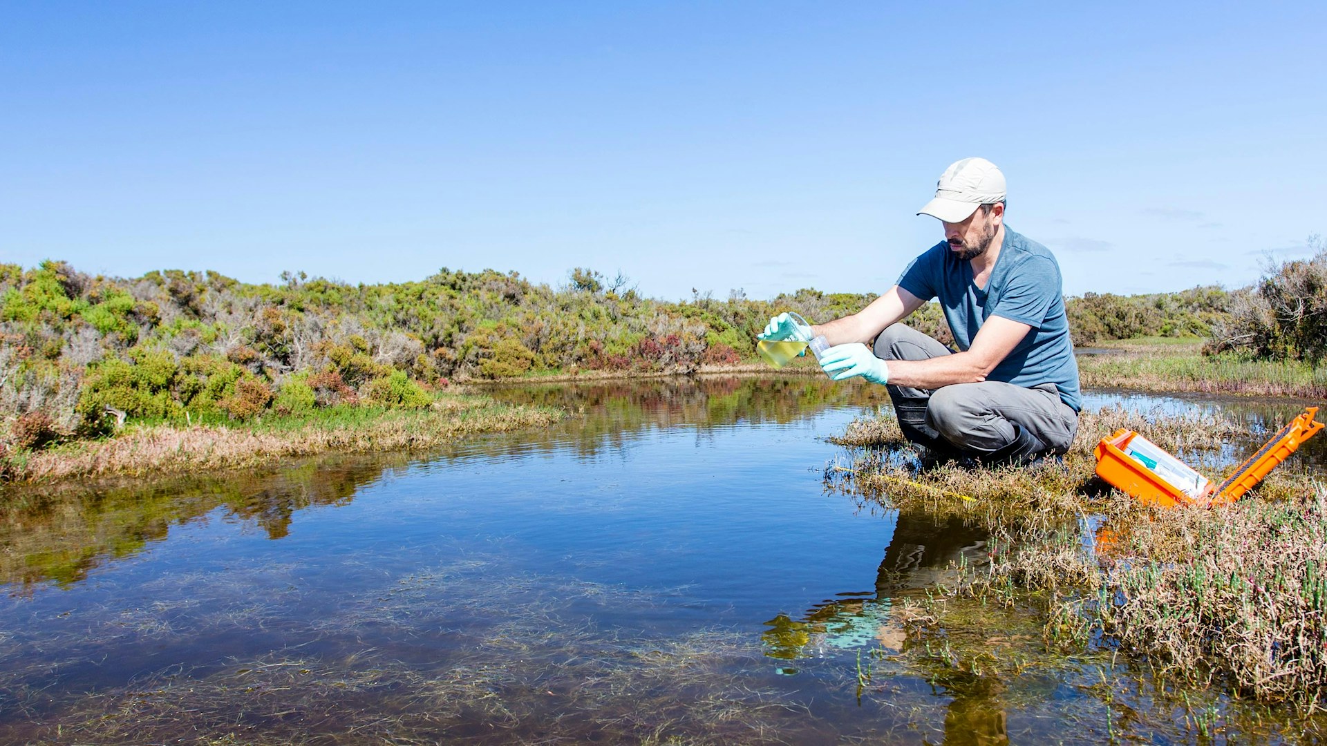 Man taking water sample