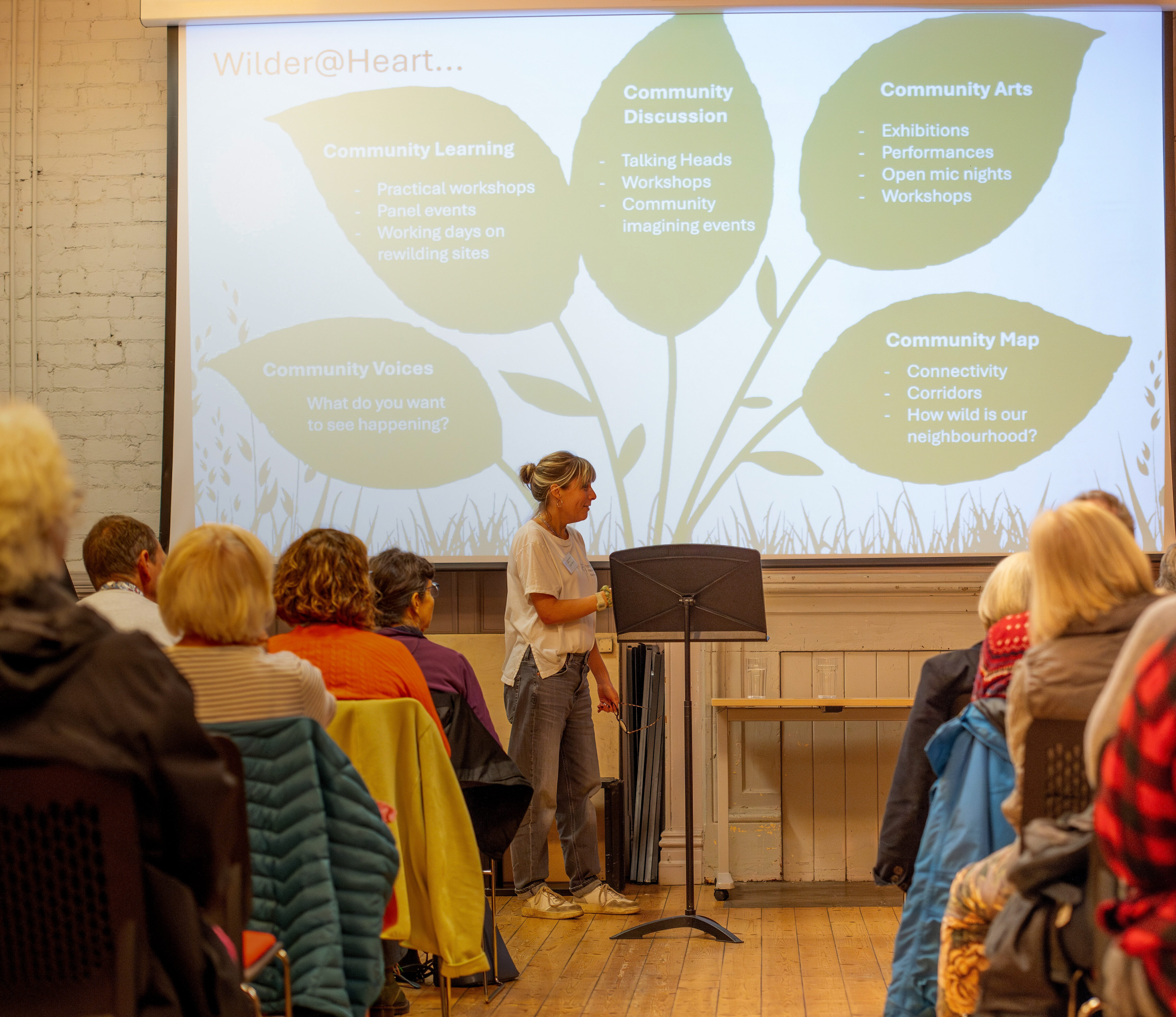 People sat listening to a talk at a Yorkshire Rewilding Network event.