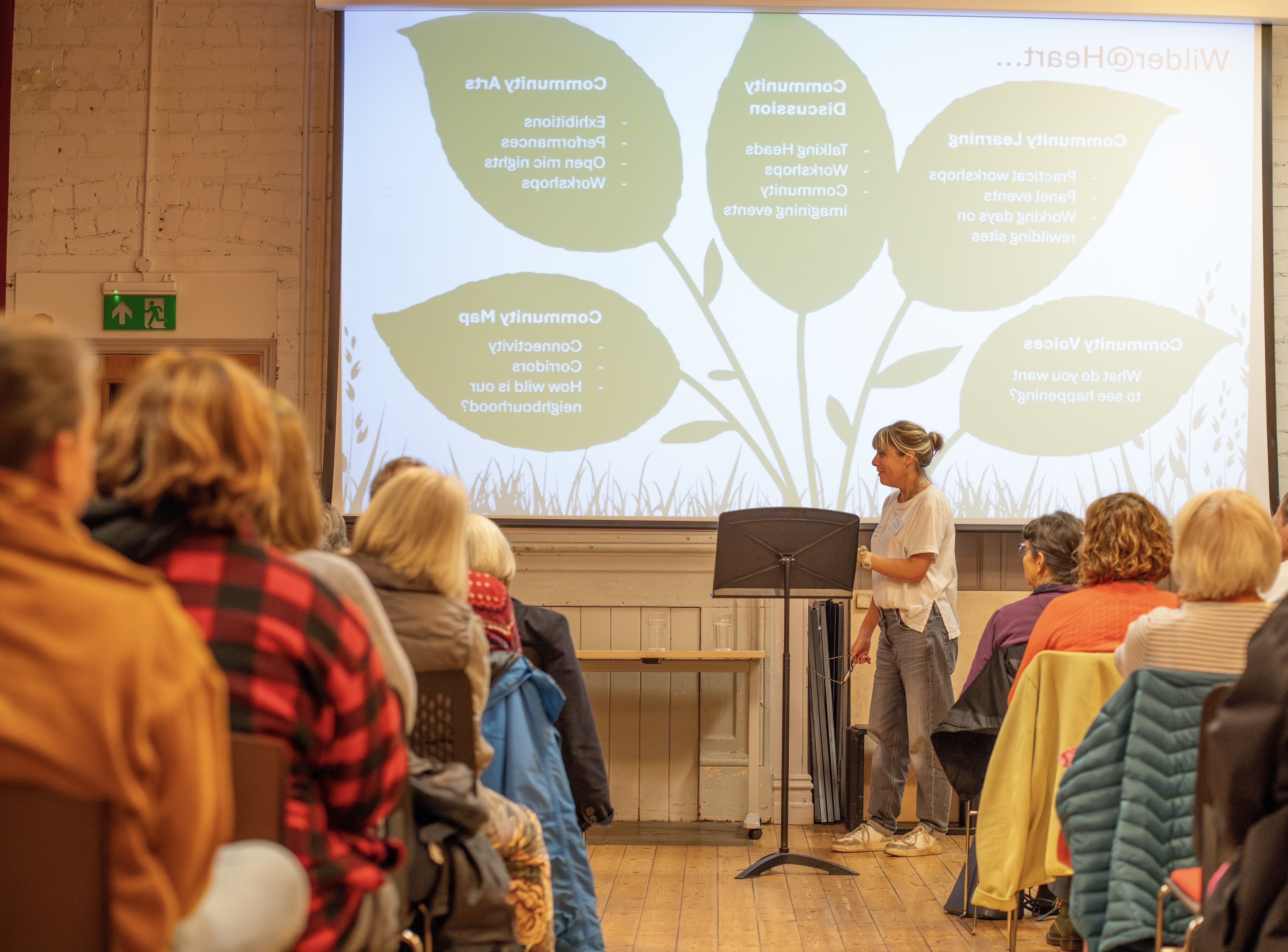 People sat listening to a talk at a Yorkshire Rewilding Network event.
